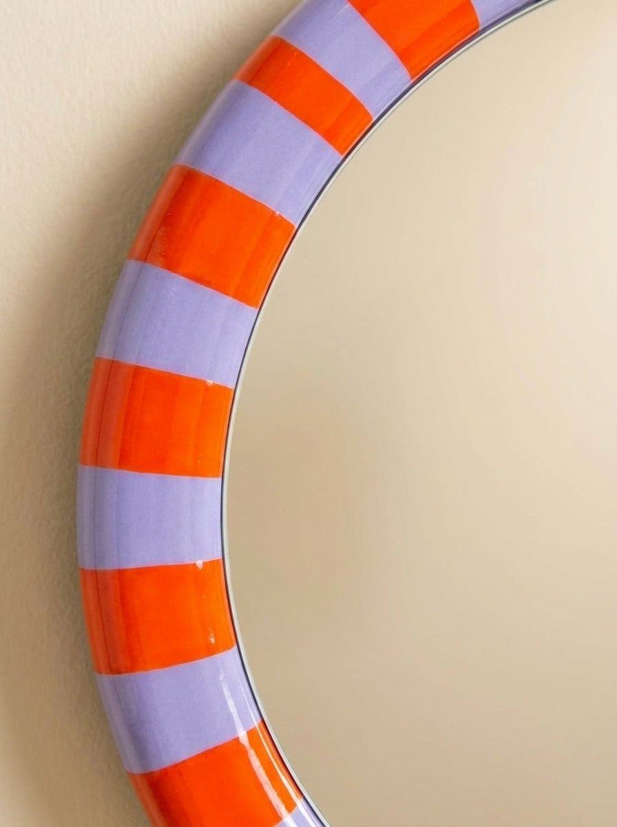 Striped round mirror